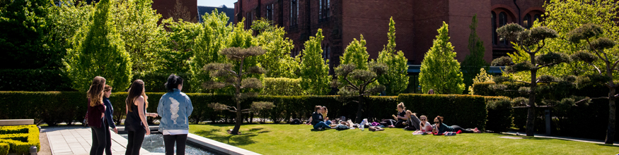 Students walking in the creative campus garden